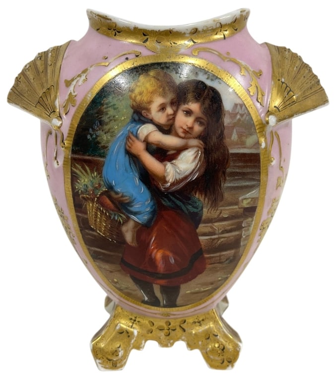 ANTIQUE ROYAL VIENNA STYLE PORCELAIN CACHEPOT VASE: Decorative antique porcelain cachepot or vase featuring a finely detailed transferware-style portrait of a young girl carrying a child, set within an ornate gilt cartouche. The body is finished in a s