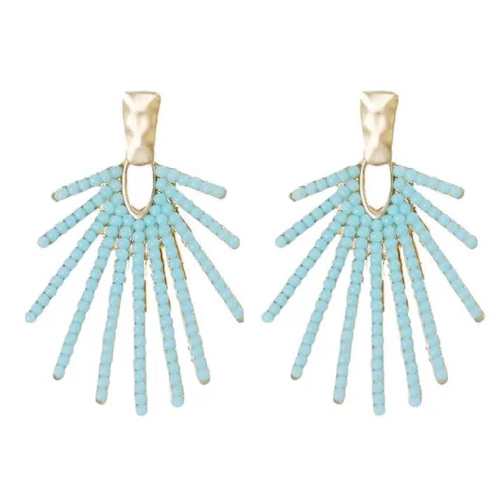 TURQUOISE SUNBURST STATEMENT EARRINGS: We absolutely love a good sunburst design! Since these have been such a hit in multiple colors, we decided to add a new lighter turquoise color for spring and summer! | | ? 2" Long | ? Post Back | ?