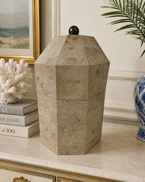MAITLAND SMITH TESSELLATED STONE LIDDED BOX 13": Striking vintage decorative lidded vessel or box featuring a tall faceted geometric form clad in neutral-toned tessellated natural stone. The stone displays attractive organic fossil-like patterning i