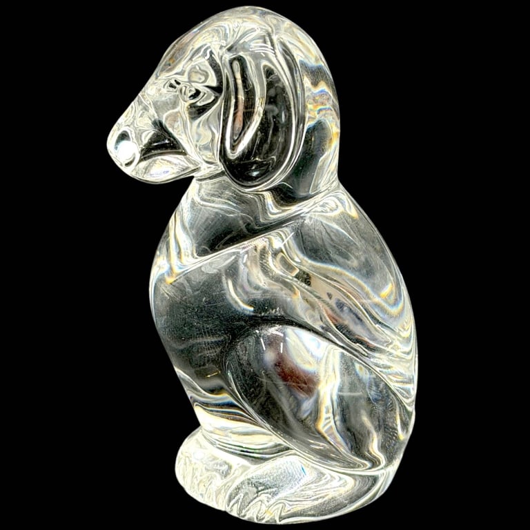 STEUBEN SIGNED CRYSTAL DOG FIGURE 3.5": Vintage signed Steuben clear crystal dog sculpture, hand-formed in substantial brilliant crystal with a charming seated pose. Features a stylized hound-like form with long drooping ears, sculpted muzz