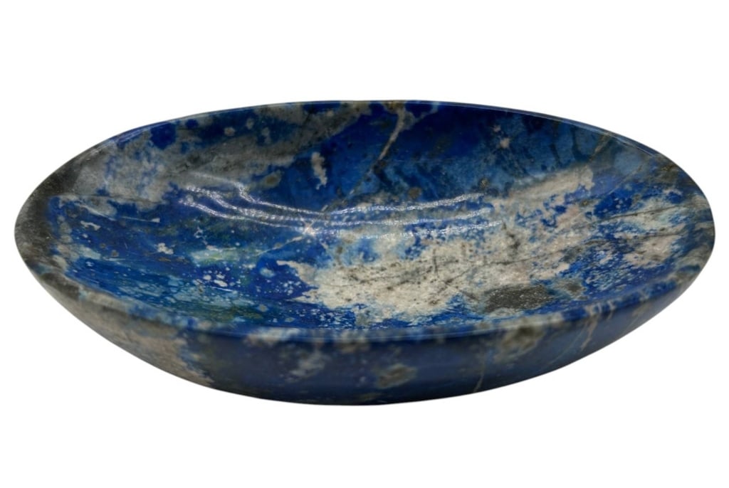 POLISHED LAPIS LAZULI STONE BOWL 4.5": Striking polished lapis lazuli decorative bowl featuring a shallow oval form and richly variegated natural stone in deep cobalt and royal blue tones with contrasting gray, white and subtle mineral vei