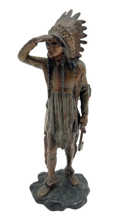 NATIVE AMERICAN CHIEF BRONZE SCULPTURE 7": Detailed vintage bronze sculpture depicting a Native American figure wearing a feathered headdress, traditional attire and braids, posed with one hand shading his eyes as he looks into the distance an
