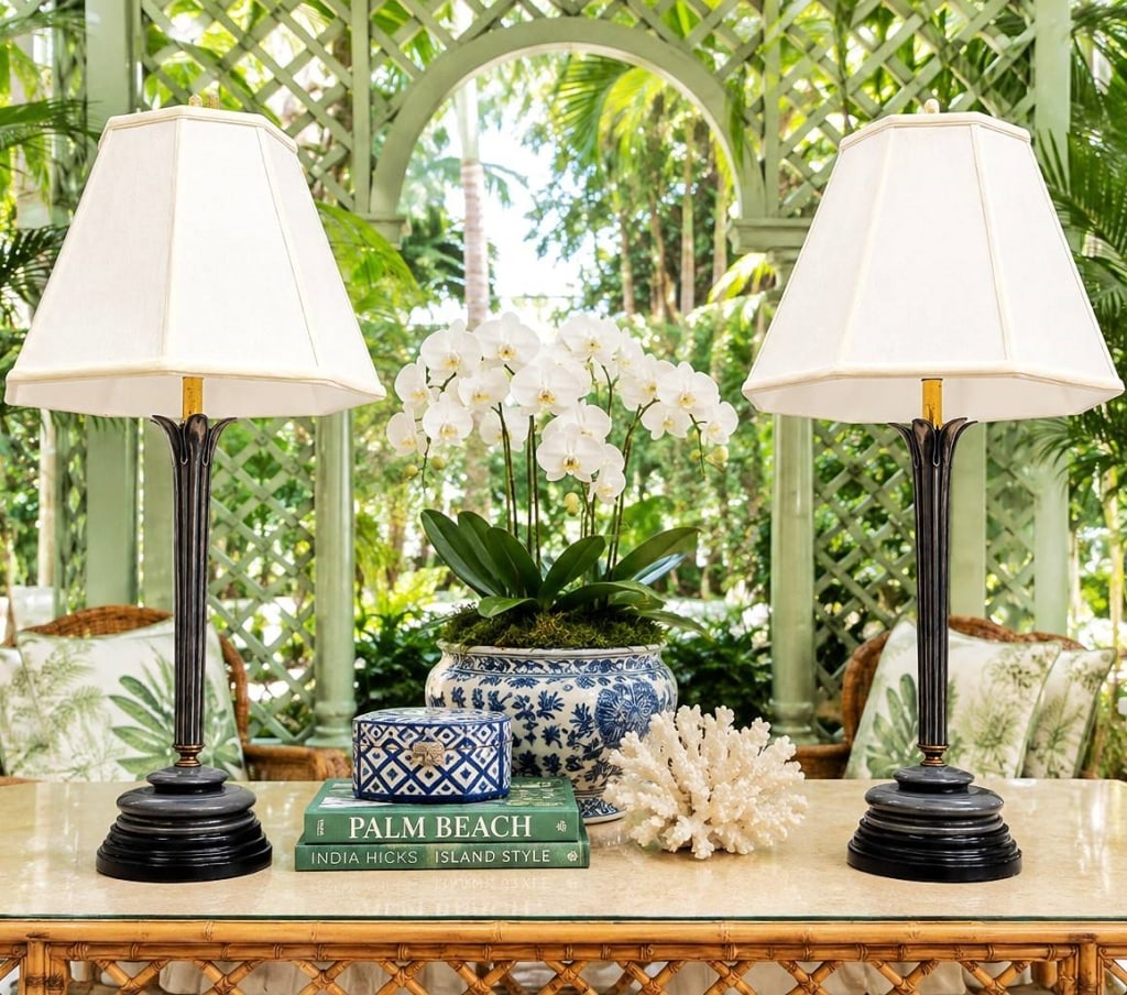 HEATH & COMPANY LOTUS TABLE LAMPS 32": Elegant pair of vintage table lamps by Heath & Company, Made in the USA, featuring tall neoclassical fluted column-form bodies with stylized lotus or acanthus-form capitals, stepped circular bases, an