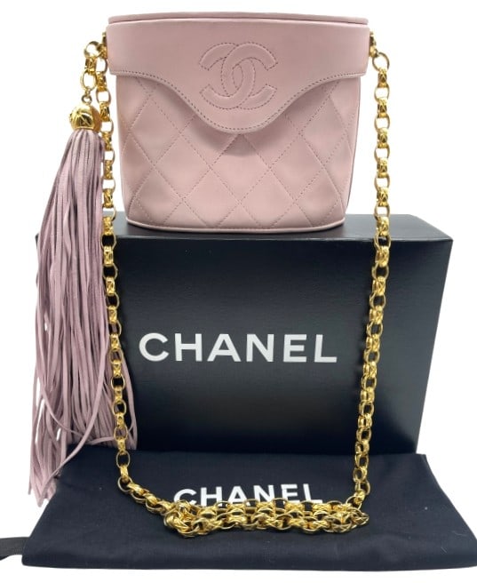 CHANEL PINK MATELASSE BINOCULAR BAG 6": An elegant and highly collectible Chanel Binocular Bag crafted in soft blush pink quilted lambskin leather with signature Matelasse diamond stitching. This whimsical novelty design features the iconic