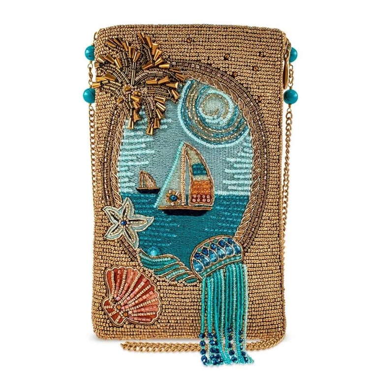 NEW MARY FRANCES SAIL AWAY BAG: Cast off and sail the day away with this intricately embellished crossbody phone bag with beaded palm trees, embroidered sailing scene, embellished sea shells and of course a jelly fish with beaded fr