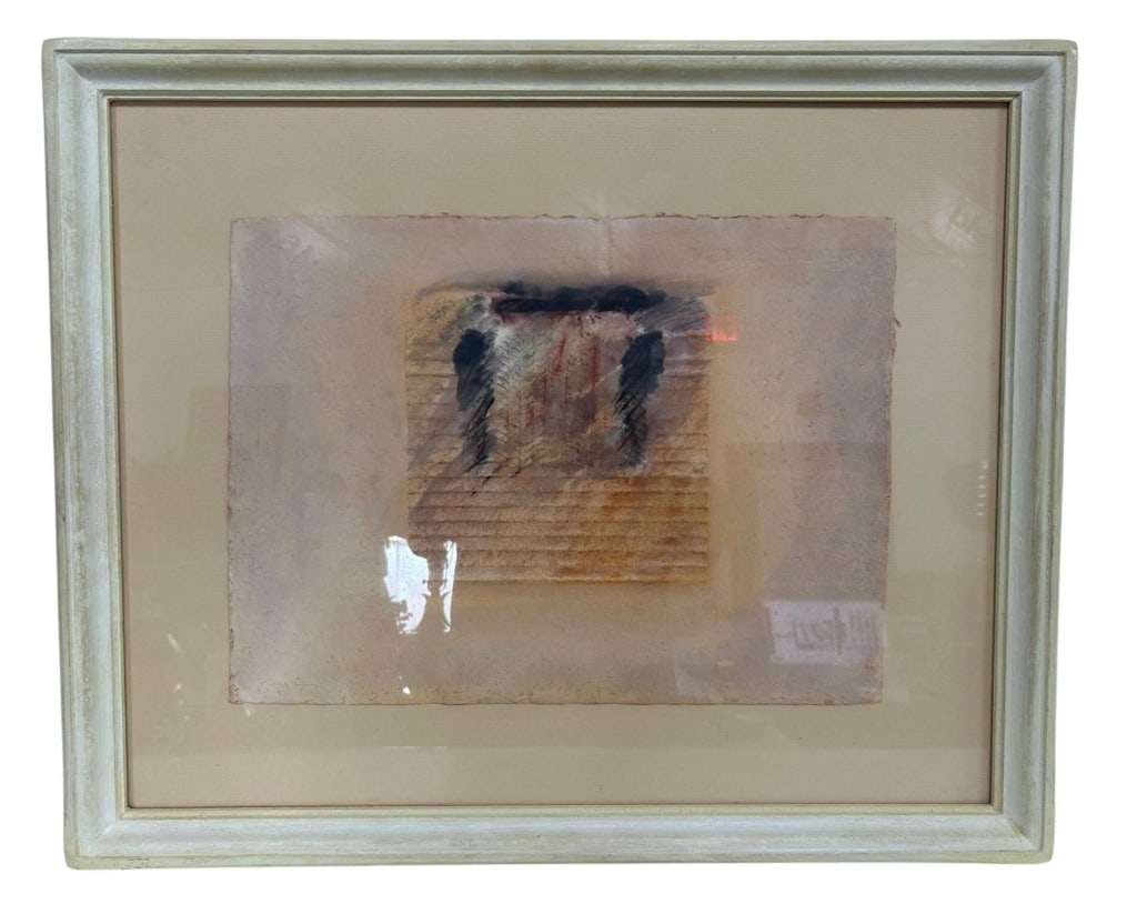 SIGNED ABSTRACT MIXED MEDIA ARTWORK 30": Framed abstract mixed media artwork on deckle-edge paper featuring a softly layered composition in muted blush, cream, rust, black and charcoal tones. The central architectural-style form combines