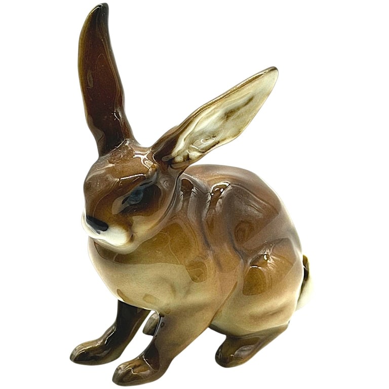 VINTAGE GERMAN PORCELAIN HARE RABBIT 4": Vintage German porcelain hare/rabbit figurine featuring a beautifully modeled seated form with exceptionally long upright ears and a glossy hand-painted finish in rich brown, tan, cream and black