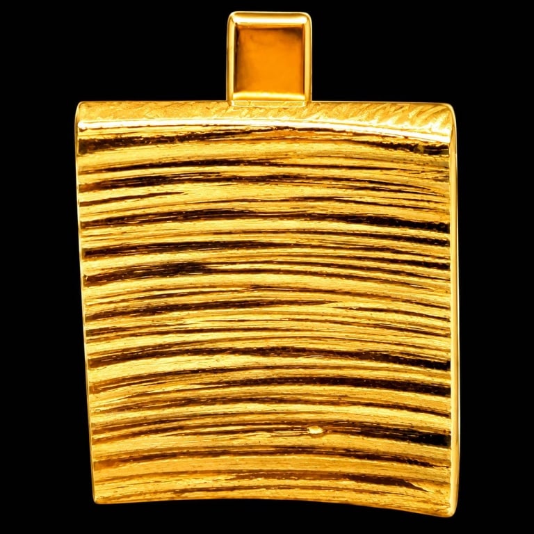 VINTAGE 14K GOLD TEXTURED CUFFLINK 12G: Vintage American 14K yellow gold single cufflink featuring a substantial curved rectangular face with handsome horizontal linear/textured decoration. The reverse is stamped with the FI jewelry tradema