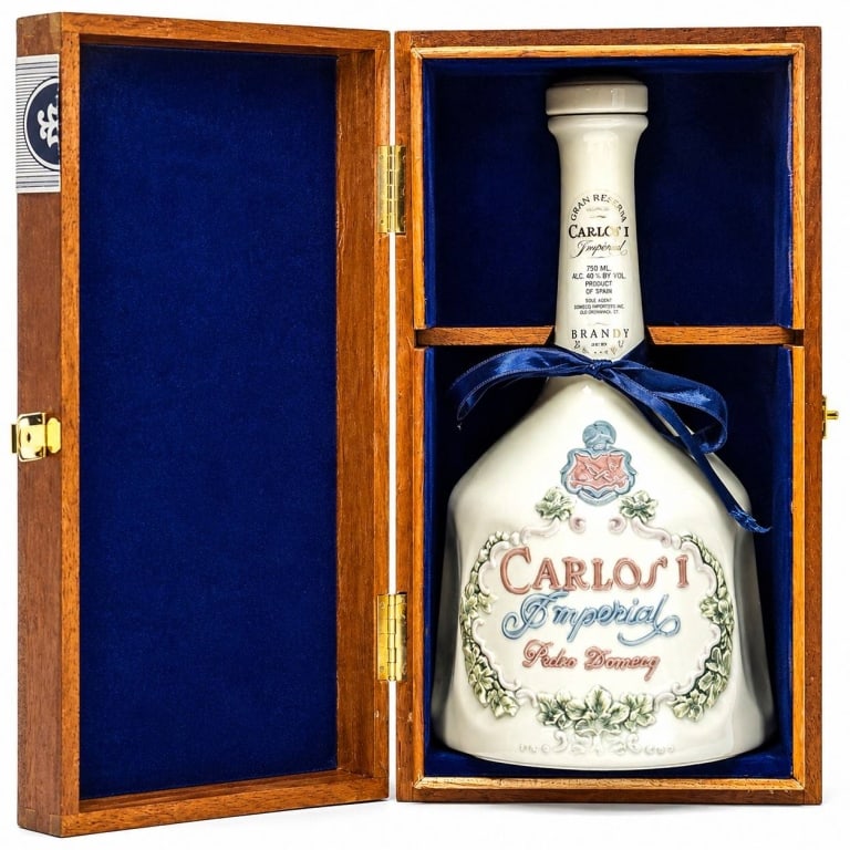 LLADRO CARLOS IMPERIAL DECANTER BOX 10.5": Vintage 1989 Lladró Carlos I Imperial Gran Reserva Brandy de Jerez porcelain decanter created for Pedro Domecq, Spain. Elegant ivory glazed porcelain bottle with raised pastel crest, floral
