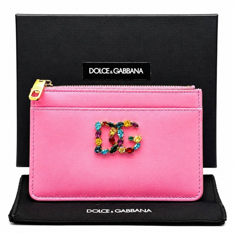 DOLCE & GABBANA DG CRYSTAL CARD HOLDER W BOX 6": Dolce & Gabbana Made in Italy pink calfskin leather zip card holder highlighted by a spectacular jewel-like DG monogram formed from individually prong-set multicolored faceted crystals in vivid blue, 
