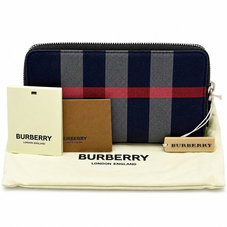 BURBERRY CHECK ZIP WALLET NWT COA 8": New with tags Burberry London England zip-around continental wallet featuring a sophisticated dark navy/black check canvas with gray vertical stripes and signature red accent stripe. Finished with bla