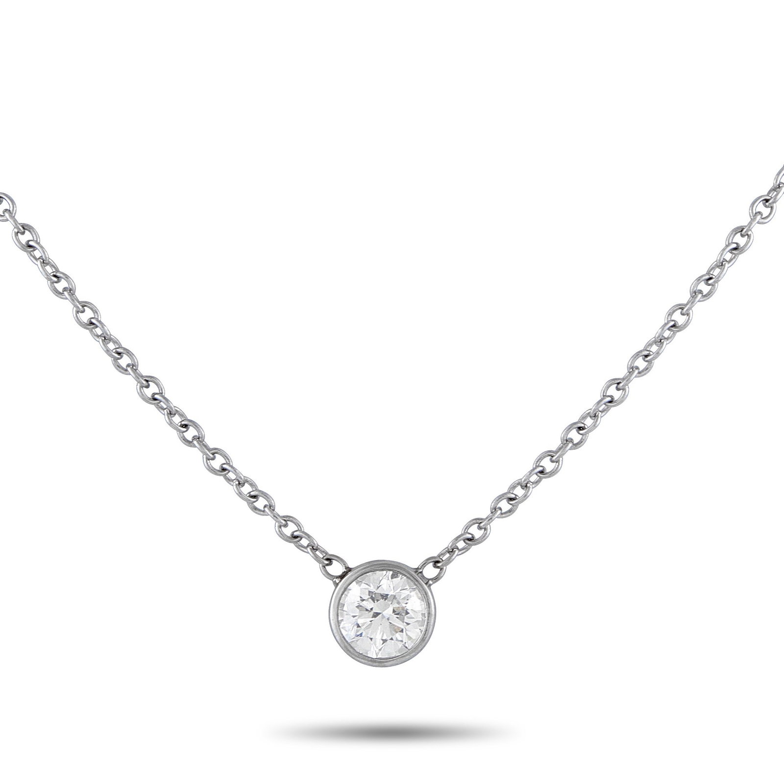 14K WHITE GOLD 0.80CT DIAMOND SOLITARE NECKLACE MF: This exquisite necklace will put the perfect finishing touch on any ensemble. The simple 0.80 carat bezel set Diamond pendant makes a subtle statement from its place at the center of a 15 chain. The p