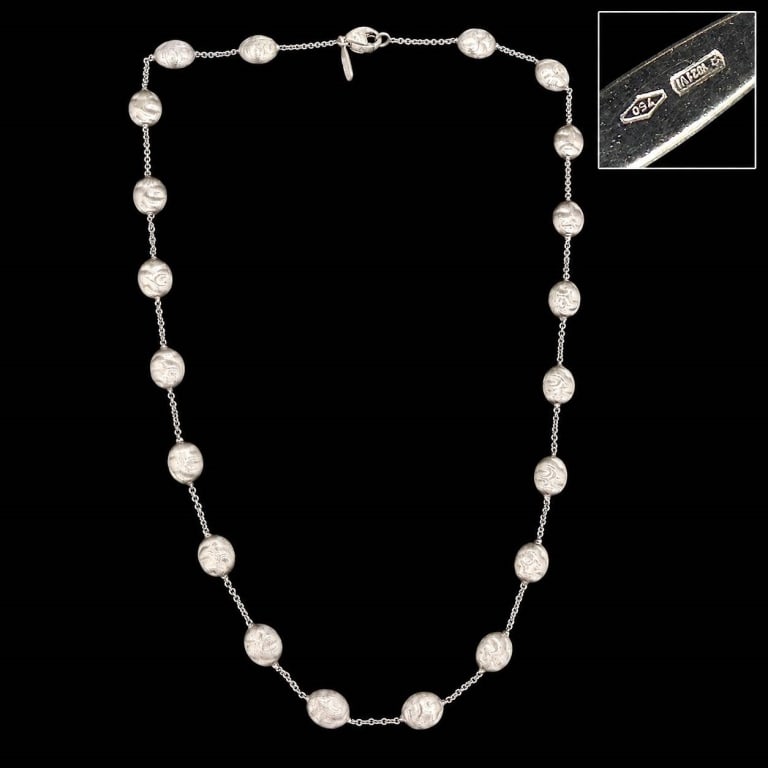 MARCO BICEGO 18K WHITE GOLD BULINO NECKLACE 15.9G: Marco Bicego Italian designer necklace crafted in 18K white gold, featuring a graduated series of organic oval beads linked by delicate chain. The beads display the finely striated, satin-like surface
