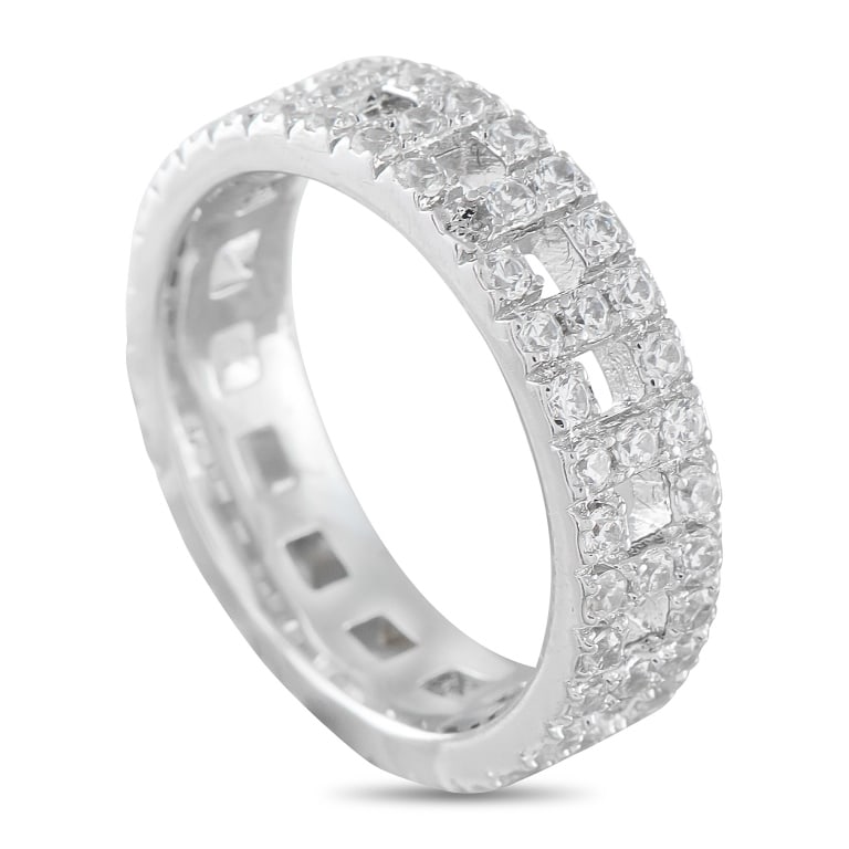 TIFFANY & CO. 18K WHITE GOLD 0.99CT DIAMOND WIDE B: This Tiffany & Co. Tiffany T True Wide ring includes alternating links that form the letter T paying homage to the luxury brands iconic motif. Sparkling pav Diamonds with a total weight of 0.99 carats