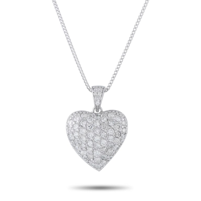 14K WHITE GOLD 2.70CT DIAMOND PAVE HEART PENDANT: A romantic and brilliantly sparkling pendant necklace in 14K white gold, centering a domed heart-shaped pendant pav-set with round brilliant diamonds totaling 2.70 ct. The pendant hangs from a fine cu