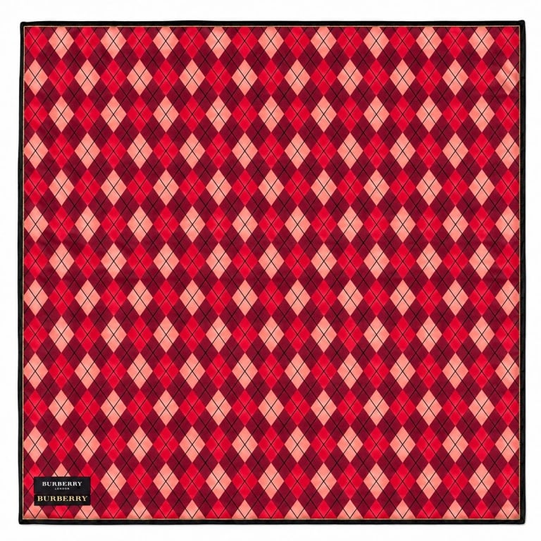 BURBERRY LONDON ARGYLE SILK SCARF NWT 18": Burberry London designer scarf presented new with original Burberry hang tag attached, featuring an allover argyle diamond motif in rich burgundy, red, coral and blush pink tones with contrasting blac