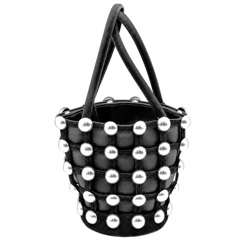 ALEXANDER WANG BLACK STUDDED ROXY BUCKET BAG 8": Alexander Wang black leather Roxy bucket tote featuring the designer's distinctive cage-inspired construction with padded leather panels arranged beneath a lattice of black leather straps. The exterio