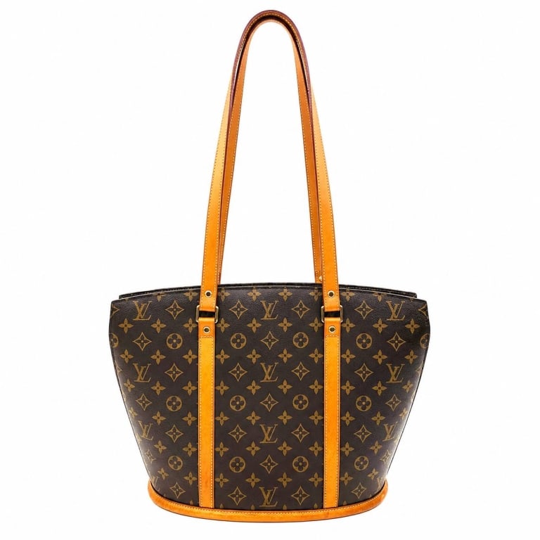 LOUIS VUITTON MONOGRAM BABYLONE XL TOTE 16": Vintage Louis Vuitton Babylone Monogram Shoulder Tote, model M51102, crafted in classic brown Monogram coated canvas with natural Vachetta leather trim, long shoulder straps and zip-top closure. The B
