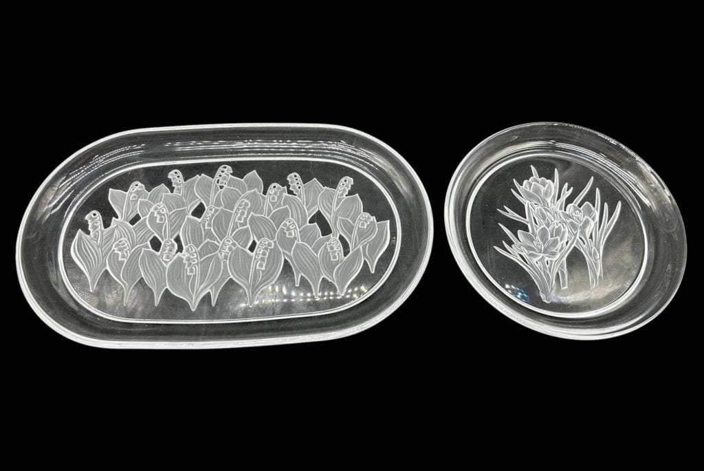 PAIR ETCHED FLORAL ART GLASS TRAYS 13.5": Pair of decorative clear art glass serving trays featuring elegant frosted botanical motifs. Includes one elongated oval tray decorated with a repeating lily-of-the-valley style floral design and one 