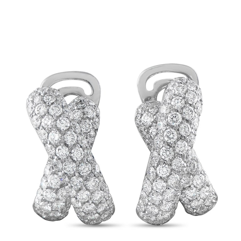 18K WHITE GOLD 3.33CT DIAMOND CROSSOVER EARRINGS: A boldly glamorous pair of estate diamond crossover earrings in 18K white gold, featuring 3.33 carats of pav-set round brilliant diamonds. Each earring presents an X-form crossover silhouette entirely