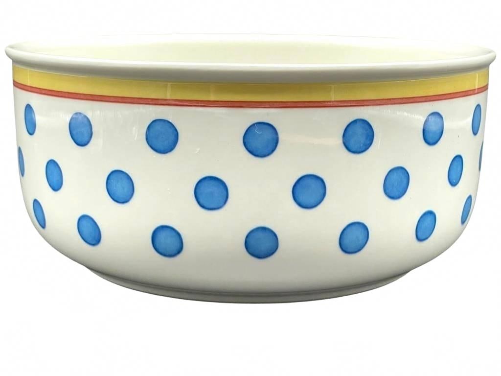 Villeroy & Boch Twist Anna Veg Serving Bowl: Porcelain serving bowl by Villeroy & Boch from the Twist Anna collection, featuring a white background with blue polka dots and yellow and red trim. Measures approximately 6.5 inches in diameter and 3