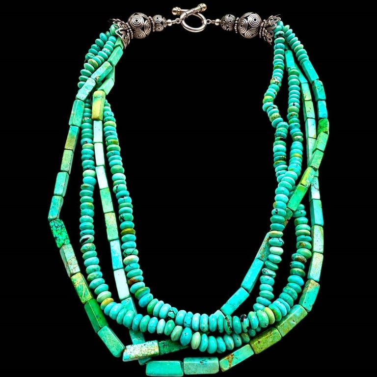 MULTI STRAND SUBSTANTIAL TURQUOISE NECKLACE 18": Striking Southwestern-style multi-strand turquoise necklace featuring four graduated strands combining polished turquoise heishi/rondelle beads with elongated rectangular turquoise beads. The stones d