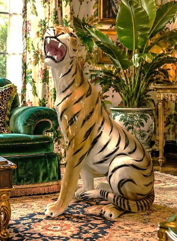 ITALIAN MAJOLICA ROARING TIGER 36": Monumental hand-painted Italian majolica tiger sculpture depicting a seated tiger with its head raised in a dramatic roaring pose. Expertly modeled with expressive facial features, lifelike musculatur