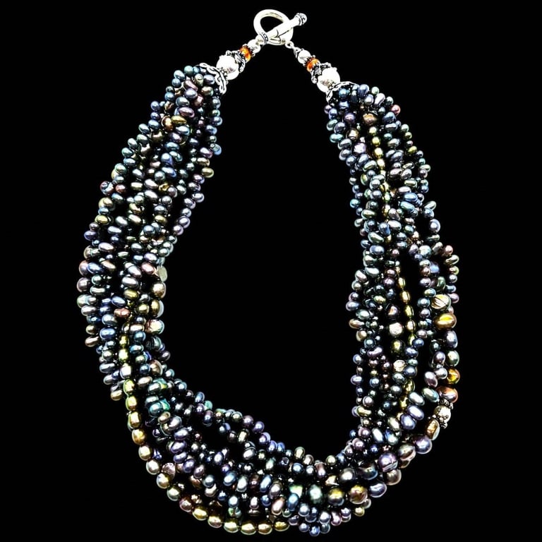 MULTI STRAND BLACK BAROQUE PEARL NECKLACE 18": Dramatic multi-strand statement necklace composed of numerous irregular freshwater baroque pearls in deep charcoal, black, peacock, bronze and silvery-gray tones. The naturally varied pearl shapes and