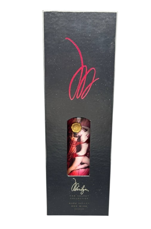 MARILYN MONROE VELVET COLLECTION WINE MAGNUM 18": Marilyn Monroe "The Velvet Collection" Napa Valley Red Wine Magnum presented in its original black collector's presentation box. The dramatic packaging features the Marilyn signature motif in red and 
