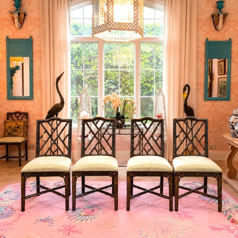 PALM BEACH REGENCY SET OF 4 BAMBOO- FORM CHAIRS: 4 bamboo-form dining chairs featuring dark grey faux bamboo frames with decorative lattice backs and upholstered seats in a ceylon green patterned fabric. The chairs offer a classic Palm Beach Regency