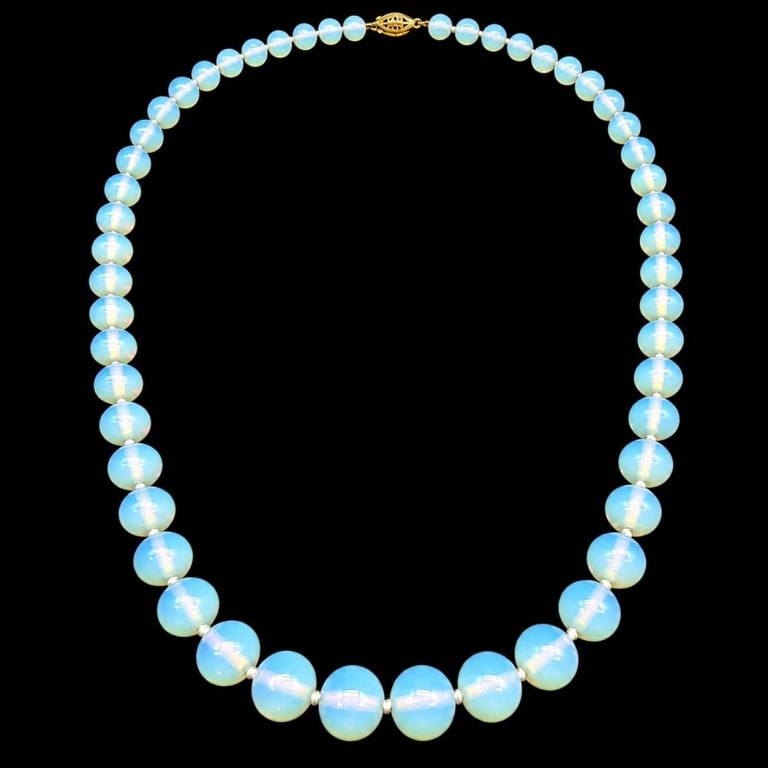 14K GOLD OPALINE BEAD NECKLACE 24": Elegant vintage necklace featuring luminous pale blue-white opaline glass beads with a soft moonlit translucence and subtle blue-green glow. The polished round beads graduate toward the center and are