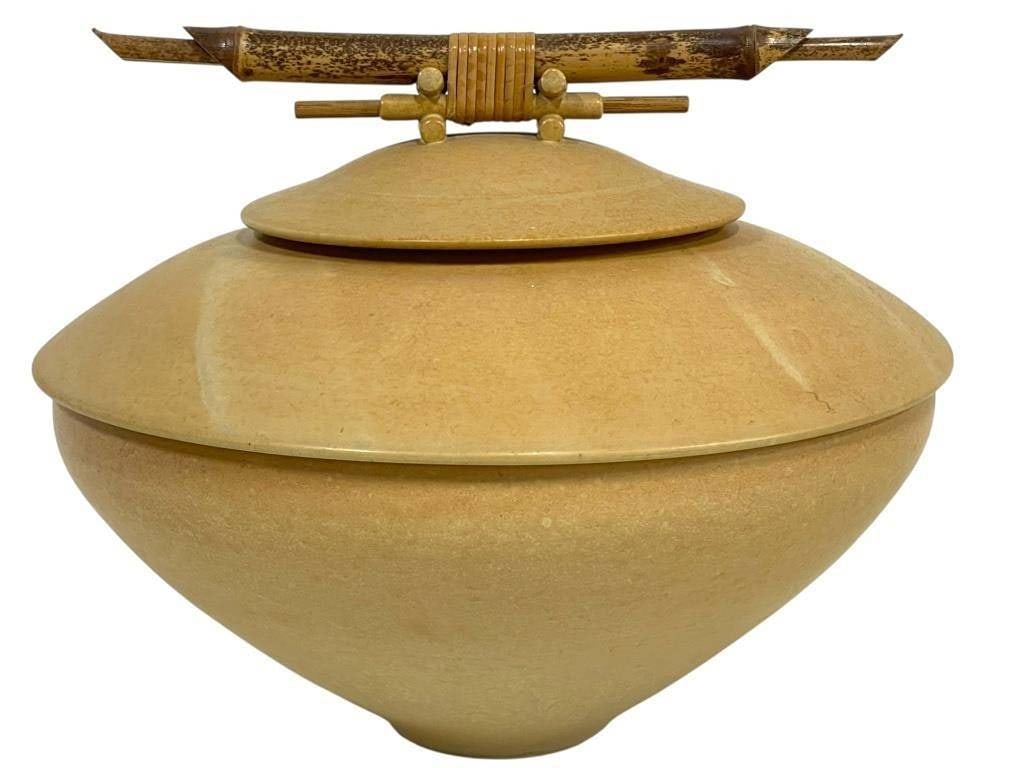 MORALES STUDIO POTTERY LIDDED VESSEL 11" D: *for alternative shipping options please go to www.dejavuauctionshipping.com | | | -SIGNED MORALES STUDIO POTTERY LIDDED VESSEL WITH CARVED WOOD HANDLE 9.5" H X 11" D APPROX | | | The contrast between