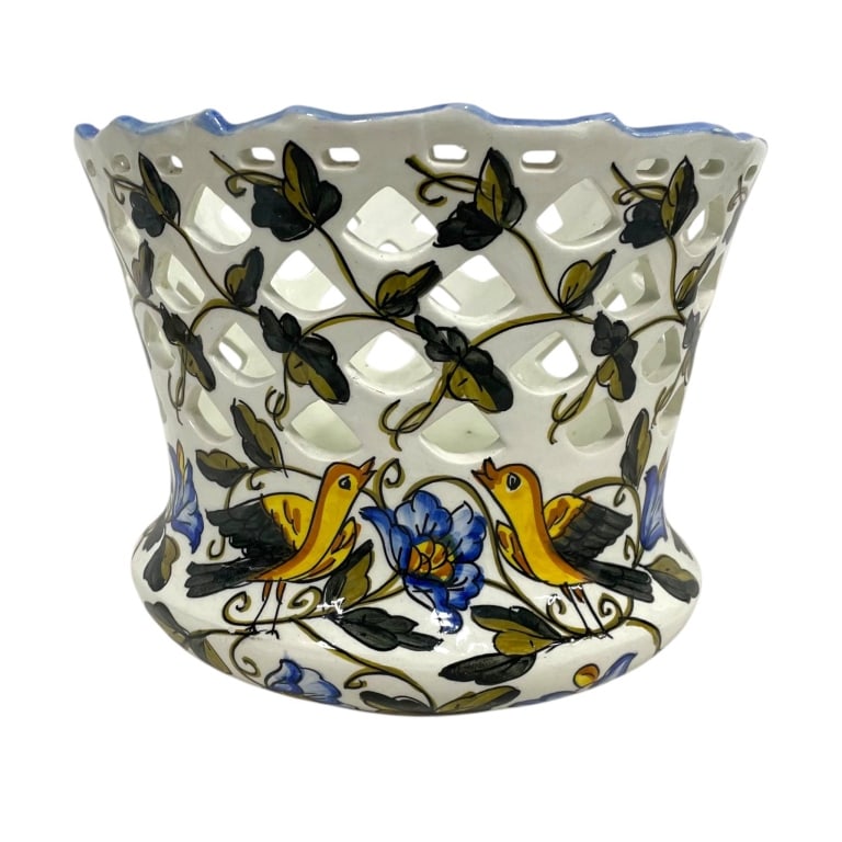 HAND PAINTED CERAMIC BIRD PLANTER 10": Decorative hand-painted ceramic planter or cachepot featuring an elaborate pierced latticework body with a gently flared and scalloped rim. The white glazed ground is richly decorated with colorful st