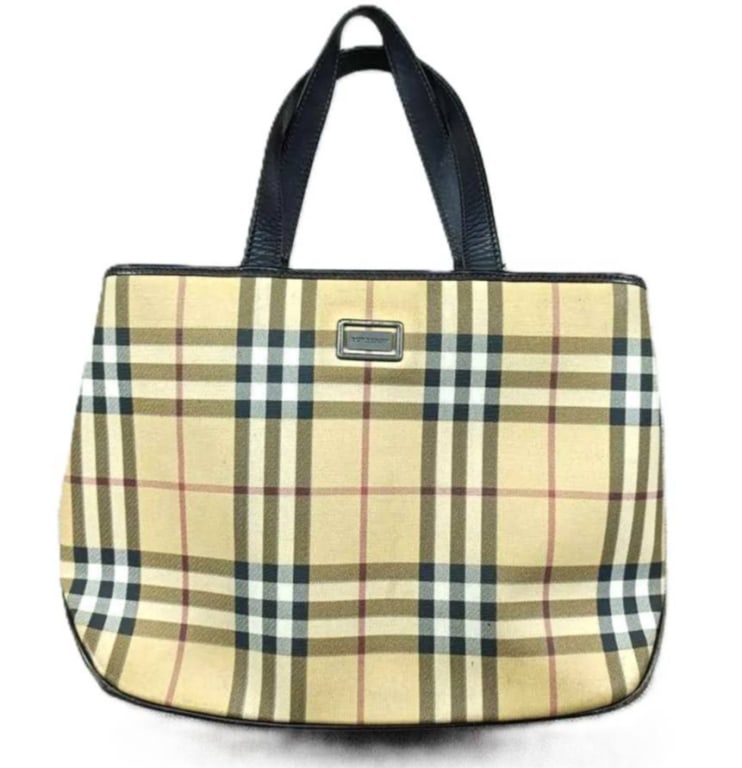 BURBERRY LONDON NOVA CHECK TOTE BAG 16": Classic vintage Burberry London Nova Check tote, crafted in the house's iconic beige, black, white and red check textile with contrasting black leather trim and double flat leather handles. The struct