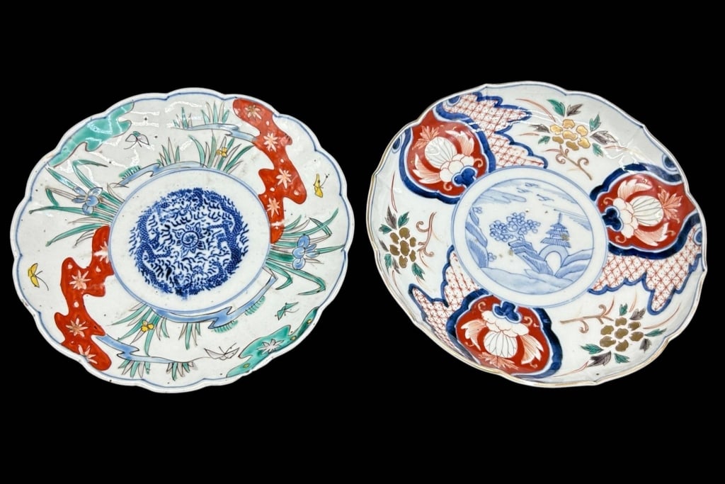 PAIR ANTIQUE JAPANESE IMARI PORCELAIN PLATES 8": Pair of antique Japanese porcelain plates, each bearing an older collection label identifying the piece as "OVER 100 yrs. IMARI." Both feature scalloped rims and richly hand-painted polychrome decorat