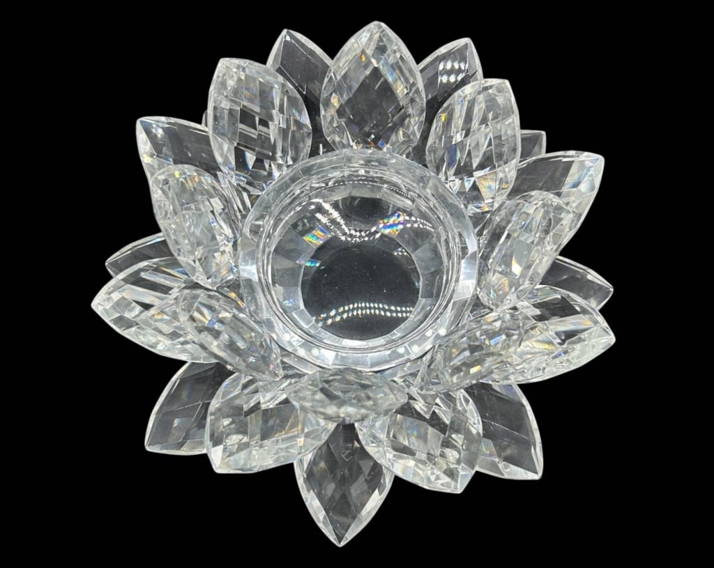 FACETED CRYSTAL LOTUS CANDLE HOLDER 8": Large clear faceted crystal lotus-form candle holder featuring multiple graduated tiers of individually cut pointed petals arranged around a central circular candle cup. The extensive faceting