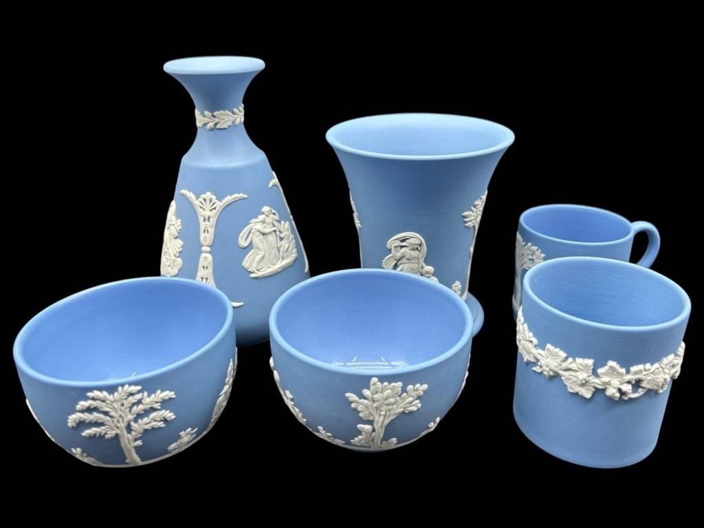 VINTAGE BLUE JASPERWARE 6-PIECE LOT 6": Collection of six vintage blue and white jasperware decorative pieces featuring matte blue bodies with applied white relief decoration in the classical Wedgwood tradition. The assortment includes a fl
