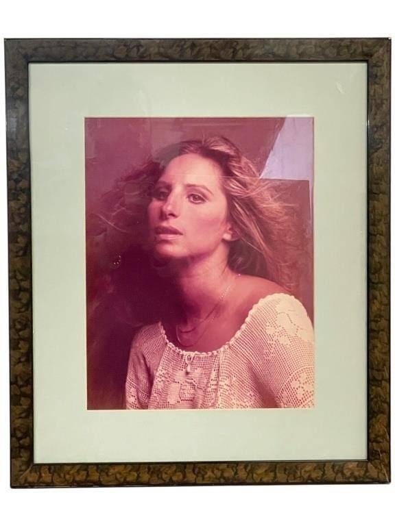 BARBRA STREISAND SOFT FOCUS GLAMOUR PORTRAIT 21": FRAMED BARBRA STREISAND SOFT FOCUS GLAMOUR PORTRAIT 21" X 18" APPROX | | | -Elegant framed portrait of Barbra Streisand featuring a romantic soft-focus composition with flowing hair and warm tonal pal