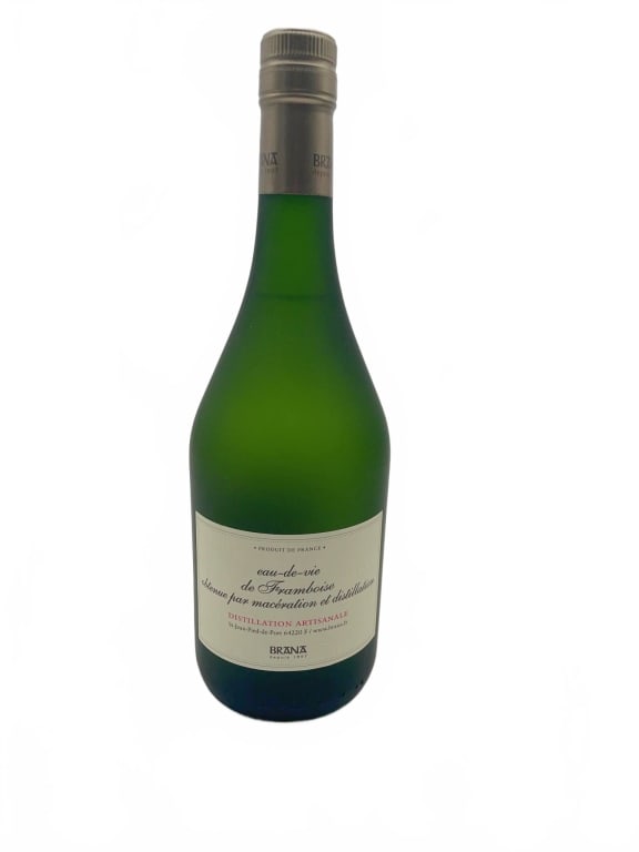 Brana Eau-de-Vie de Framboise Distillation Artisan: Brana Eau-de-Vie de Framboise distilled spirit from France. This bottle features distillation artisanale and is labeled in French. It is sealed and contains 40% alcohol by volume, with 700 ml indicate