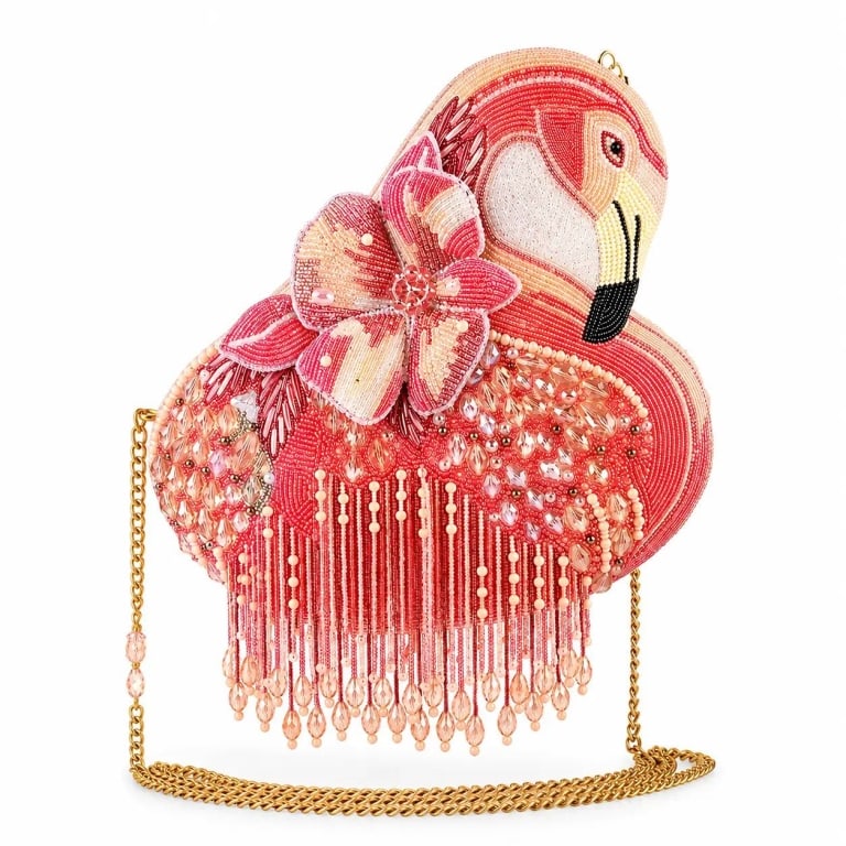 NEW MARY FRACES A LEG TO STAND ON BAG: Every Mary Frances piece is handmade! | | With its dazzling pink beadwork and cascading fringe, A Leg to Stand On Flamingo Crossbody's unique design and shimmering details make it a standout accessory