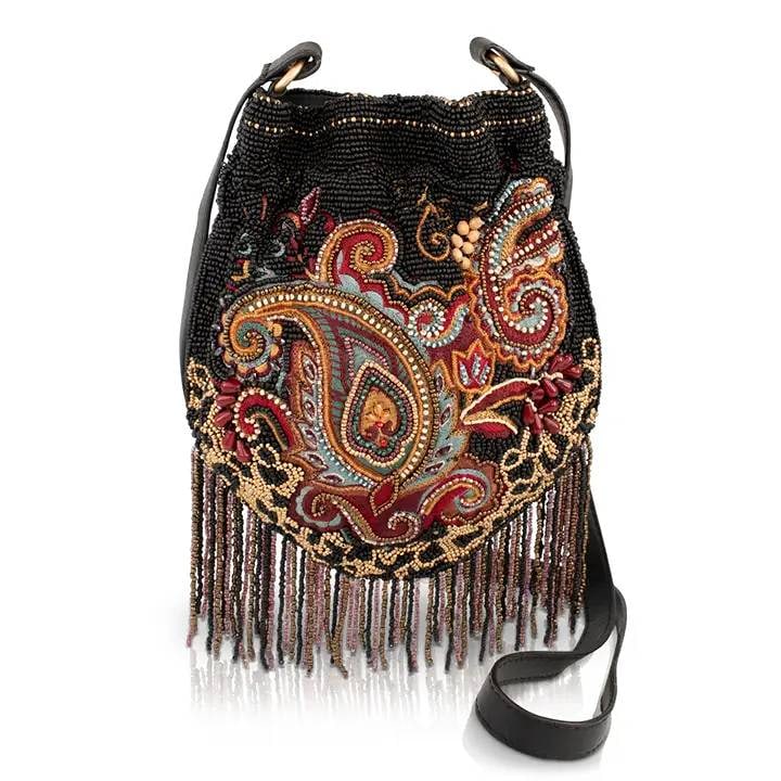 NEW MARY FRANCES OHO CARAVAN: Some bags just have rhythm. In the Groove is a hand-beaded fringe handbag layered with rich paisley swirls in garnet, gold, and teal, finished with a curtain of multicolor beaded fringe that moves as 