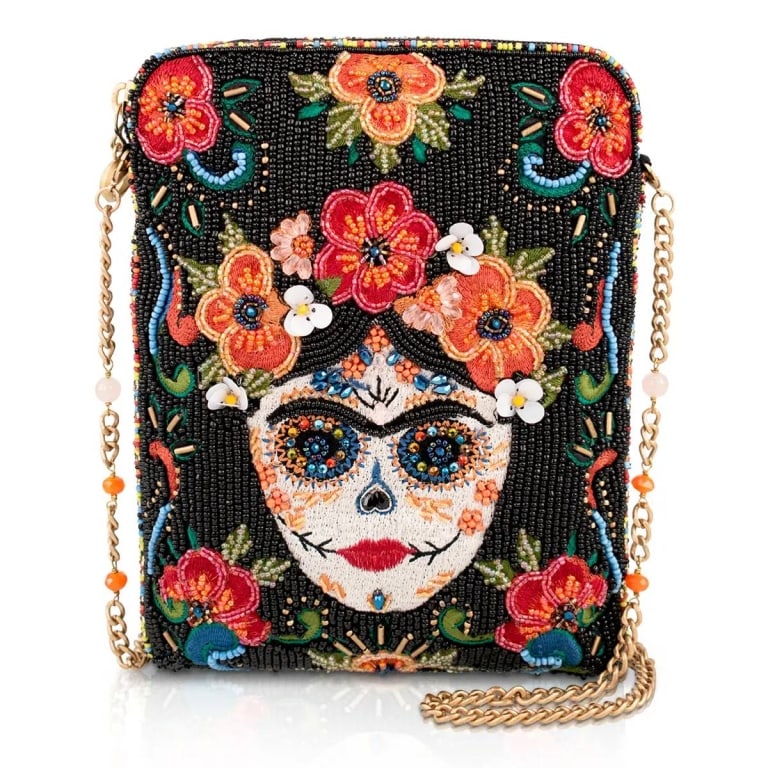 NEW MARY FRANCES DAY OF GLAM SKULL BAG: Bold blooms and a beautifully detailed sugar skull make this Day of the Dead crossbody purse impossible to overlook. Set against a dramatic black backdrop, the colorful floral design brings every deta