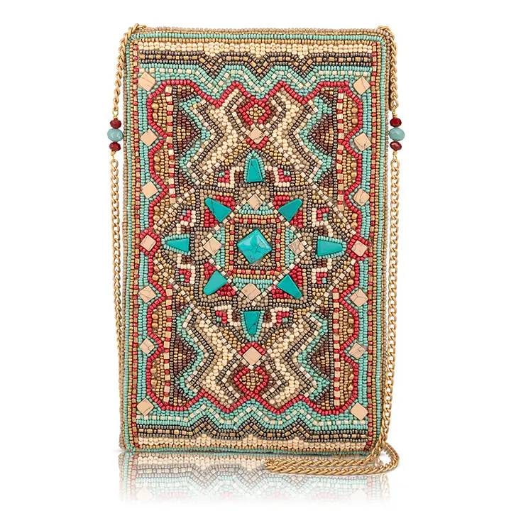 NEW MARY FRANCES TURQUOISE TRAIL BAG: Follow your own path with Turquoise Trail, a geometric crossbody handbag inspired by timeless artisan design. A striking turquoise centerpiece, rich earthy tones, and intricate patterns come together