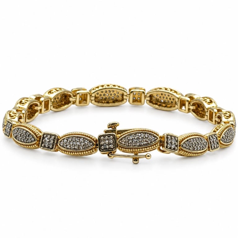 GOLD VERMEIL DIAMOND LINK BRACELET 7": Elegant gold vermeil bracelet featuring alternating marquise and square links accented with genuine diamond chips in contrasting darkened settings. Each marquise station is framed with delicate beaded