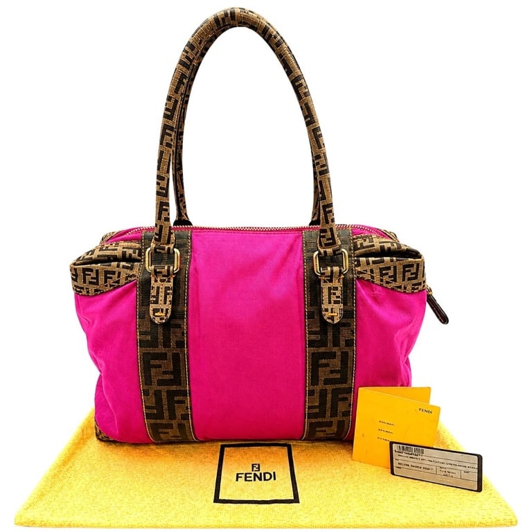 FENDI FOREVER BAULETTO MAGENTA BAG 18": Rare Fendi Forever Bauletto mixed-media handbag in vibrant magenta textile with iconic brown FF Zucca monogram canvas trim, double FF shoulder handles and contrasting golden stitching. Bowler silhouet