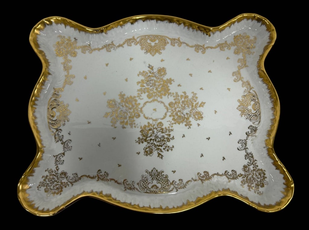 FRENCH HAND PAINTED GILT PORCELAIN TRAY 17": Elegant French porcelain vanity or serving tray featuring a dramatic shaped Rococo-style outline with richly applied gilt decoration. The white glazed porcelain is embellished with intricate gold flor