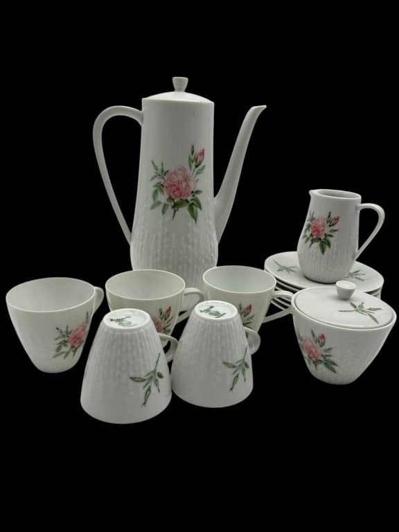 VINTAGE FLORAL PORCELAIN TEA SET 14 PCS: Charming vintage porcelain tea and coffee service featuring a delicate pink rose floral pattern with green foliage on a crisp white ground. The pieces have an attractive textured lower body with a
