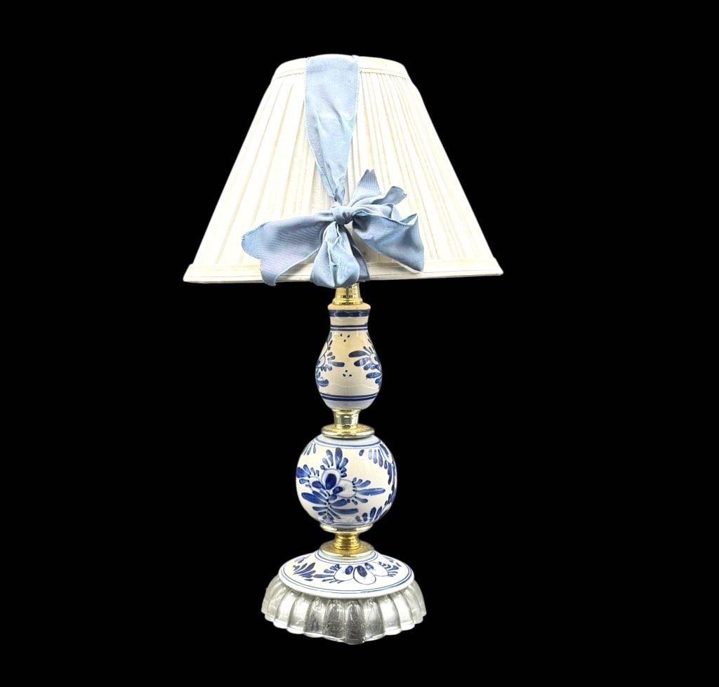 BLUE & WHITE FLORAL TABLE LAMP 14.5": Charming ceramic accent lamp featuring cobalt-blue floral and leafy decoration against an ivory ground. The sculptural body combines a rounded lower section with a slender vase-shaped upper section, s