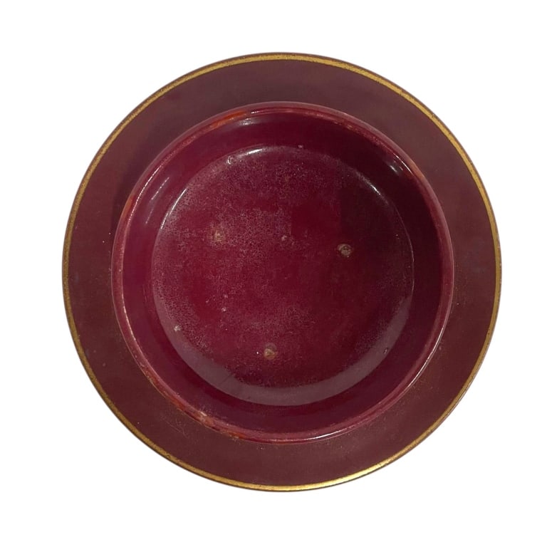 VINTAGE BURGUNDY GOLD TRIM CERAMIC ASHTRAY: Classic vintage ceramic ashtray or smoking accessory finished in a rich burgundy-red glaze with contrasting gold gilt trim around the outer rim and raised central well. The low circular form features 