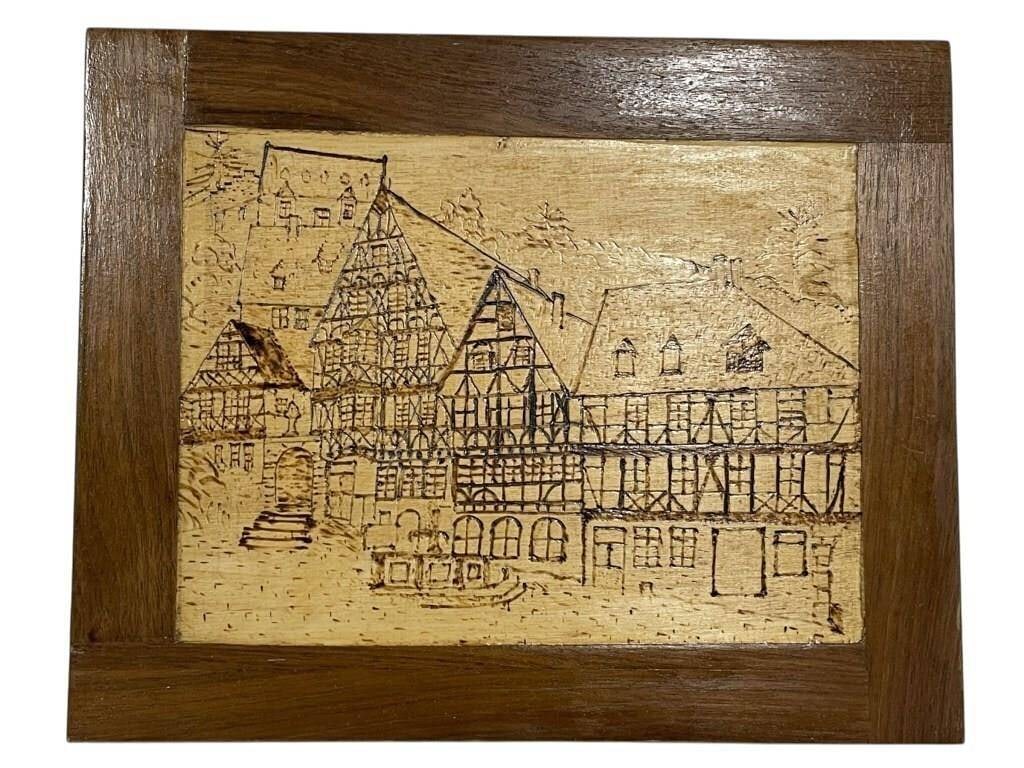 VINTAGE GERMAN WOOD WALL PLAQUE 10": VINTAGE GERMAN WOOD WALL PLAQUE 10" | -Very good pre owned condition | -Approx 10"l x .75"w x 8"h | -The scene is intricately etched and framed in solid wood, showcasing fine craftsmanship and rustic 
